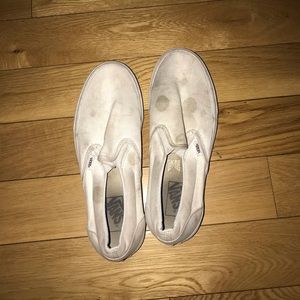 White vans, heavily worn